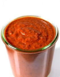 Enchilada Sauce makes a staple ingredient to keep on hand for quick meals. Get this family-favorite easy homemade enchilada sauce recipe. // addapinch.com