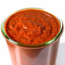 Enchilada Sauce makes a staple ingredient to keep on hand for quick meals. Get this family-favorite easy homemade enchilada sauce recipe. // addapinch.com