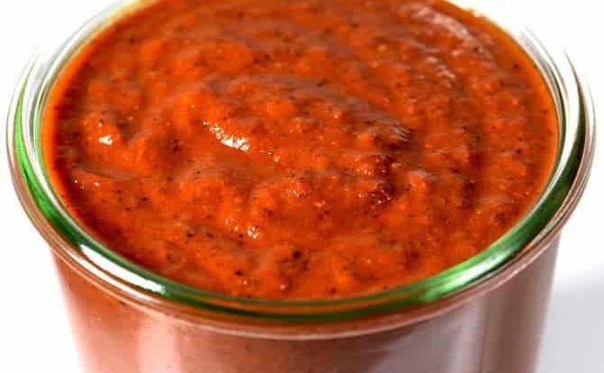 Enchilada Sauce makes a staple ingredient to keep on hand for quick meals. Get this family-favorite easy homemade enchilada sauce recipe. // addapinch.com
