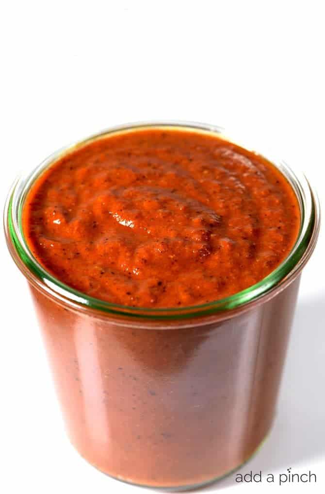 Enchilada Sauce makes a staple ingredient to keep on hand for quick meals. This easy red enchilada sauce comes together quickly and keeps in the refrigerator for up to two weeks! // addapinch.com