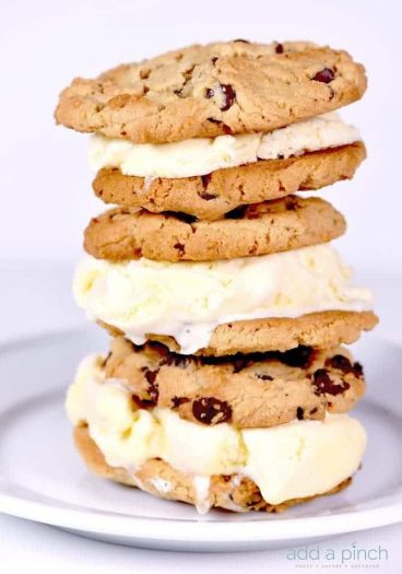 Ice cream sandwiches make a favorite sweet treat! This peanut butter ice cream sandwich is one that the whole family loves! // addapinch.com