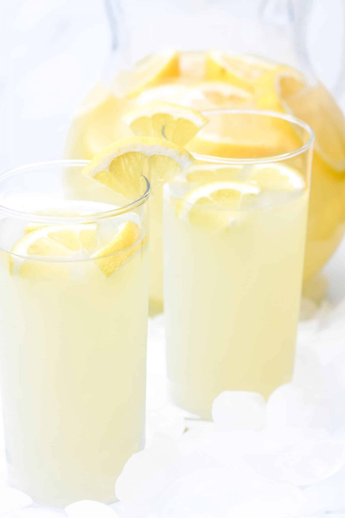 Lemonade Recipe - Refreshing homemade Fresh Lemonade recipe made with fresh lemons! It's a classic delicious drink perfect for any occasion! Makes the perfect cold drink and is such a family favorite! // addapinch.com