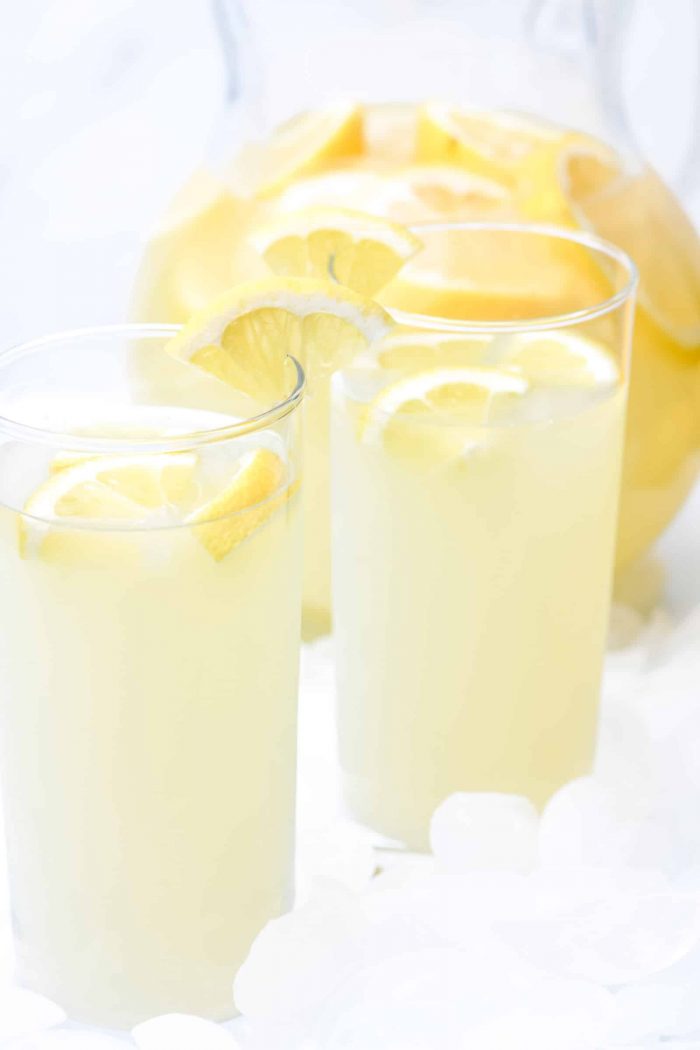 Lemonade Recipe - Refreshing homemade Fresh Lemonade recipe made with fresh lemons! It's a classic delicious drink perfect for any occasion! Makes the perfect cold drink and is such a family favorite! // addapinch.com