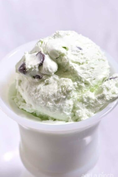 Mint Chocolate Chip Ice Cream made from simple ingredients and so easy! If you have mint chocolate chip ice cream lovers in your house, you need this recipe! // addapinch.com