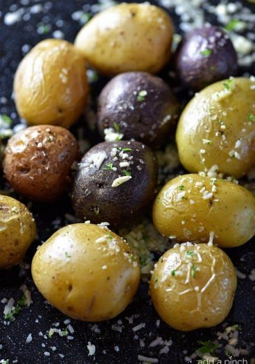 Parmesan Roasted Potatoes make a delicious side dish! So easy and perfect for a weeknight supper! // addapinch.com