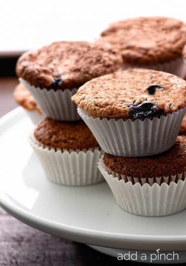 Blueberry Banana Bread Muffins make a delicious treat for breakfast or an delicious snack! // addapinch.com