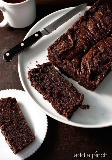 Chocolate Zucchini Bread makes a moist, delicious recipe perfect for serving for breakfast, brunch, a snack or even dessert! // addapinch.com
