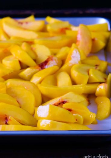 How to Freeze Fresh Peaches in a few simple steps preserves that summer freshness for later use! // addapinch.com
