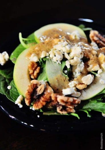 Apple Walnut Salad - Apple Walnut Salad is a delicious blend of spinach, tart juicy apples, walnuts and creamy bleu cheese crumbles. It is simply perfect for fall. // addapinch.com