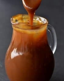 Salted Caramel Sauce Recipe - The absolute best salted caramel sauce recipe that I have ever tasted! Smooth, creamy and perfect every single time! // addapinch.com