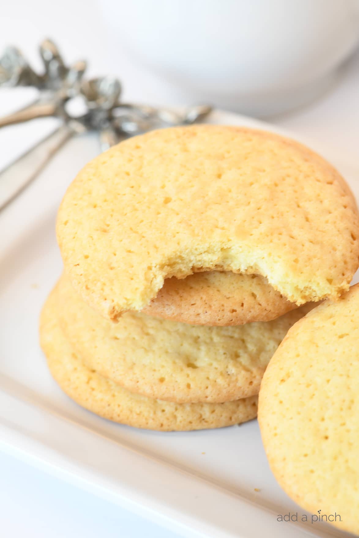 Photograph of tea cakes on a white platter. 