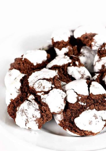 Chocolate Crinkle Cookies Recipe - Chocolate crinkle cookies coated in powdered sugar and baked into a soft, chewy, delicious chocolate cookie! What's not to love! // addapinch.com