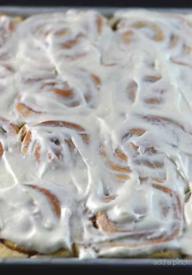Cinnamon rolls covered in Cream Cheese Icing // addapinch.com