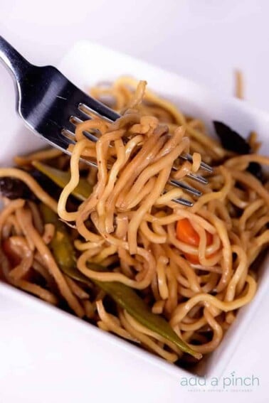 Easy Lo Mein Recipe - This Lo Mein recipe makes a quick and easy meal or filling side dish! A take-out favorite, this lo mein recipe is even better at home! // addapinch.com
