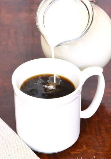 Homemade Coffee Creamer makes a quick, easy, and delicious treat for your coffee! Made with just four ingredients and ready in minutes! // addapinch.com