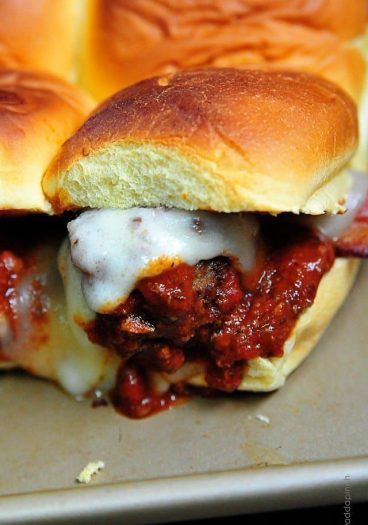 Meatball Sliders make a great appetizer, lunch or even supper! Just be sure to make plenty of these meatball sliders! // addapinch.com