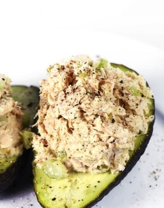 Tuna Salad Recipe - This Tuna Salad recipe makes a delicious, flavorful recipe perfect for lunch or a light supper! Stuffed into an avocado, as a sandwich or served on a lettuce leaf! // addapinch.com