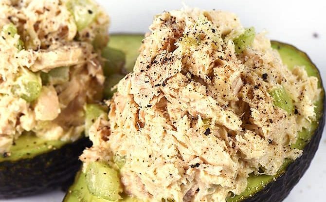 Tuna Salad Recipe - This Tuna Salad recipe makes a delicious, flavorful recipe perfect for lunch or a light supper! Stuffed into an avocado, as a sandwich or served on a lettuce leaf! // addapinch.com