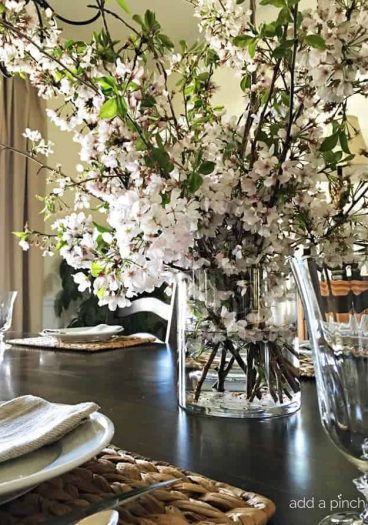 A cherry blossom branch arrangement makes an easy and elegant arrangement to welcome spring into your home! // addapinch.com