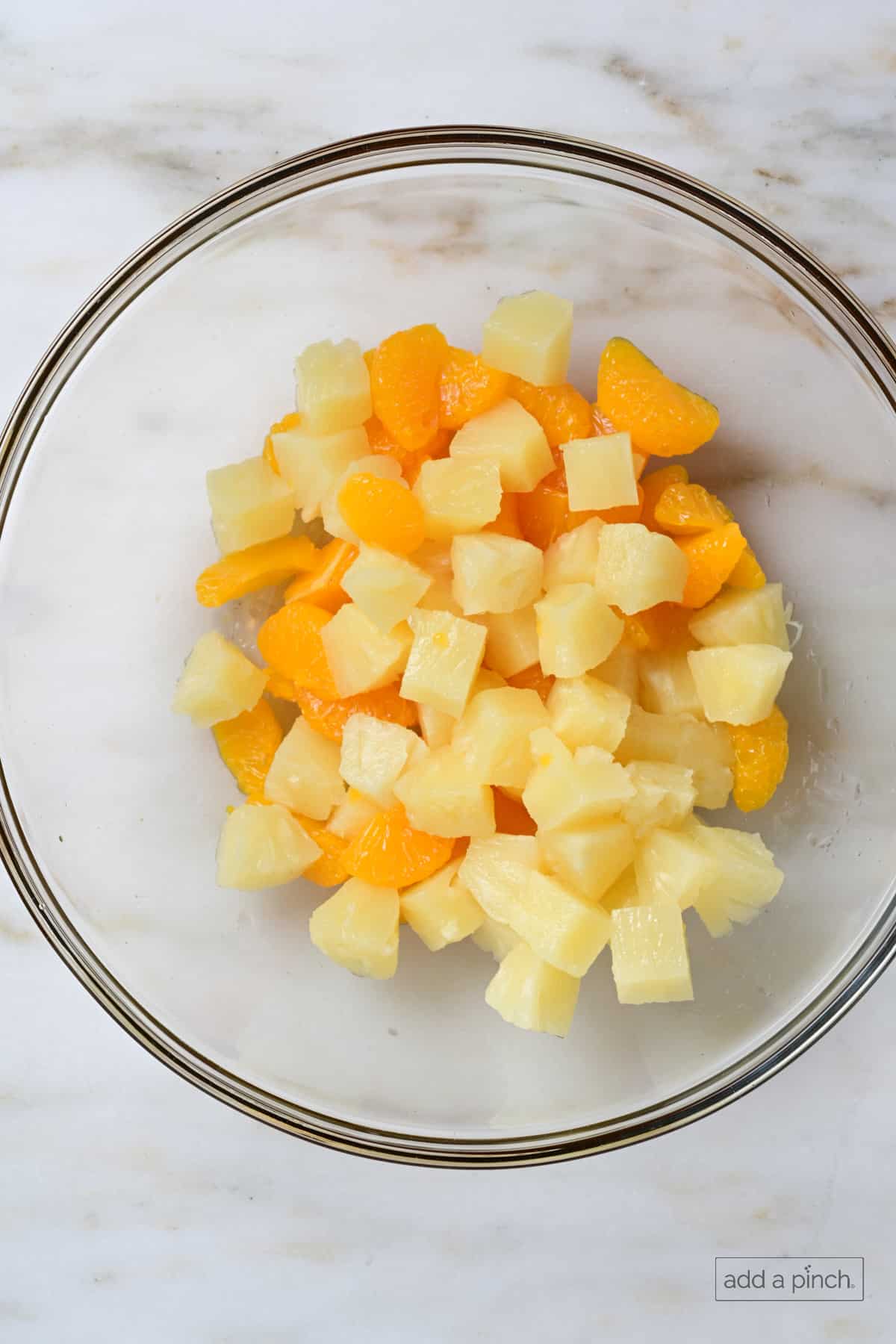 Fruit in a mixing bowl.