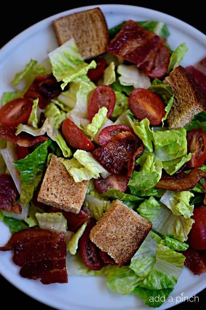 BLT Panzanella Salad Recipe - This BLT Panzanella Salad recipe comes together quickly for a delicious lunch or supper! Ready and on the table in minutes! // addapinch.com
