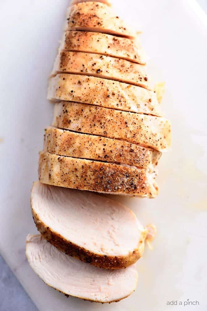 Simple Baked Chicken Breast Recipe - Learning how to make baked chicken breast just got simple with this foolproof recipe. Ready and on the table in less than 30 minutes, but perfect to make-ahead for busy weeknights, too! // addapinch.com