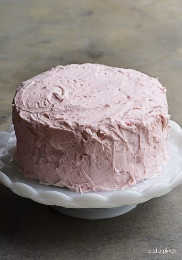 Strawberry Cake Recipe - Strawberry Cake made from scratch! This strawberry cake recipe is perfect for those looking for a homemade fresh strawberry cake. // addapinch.com