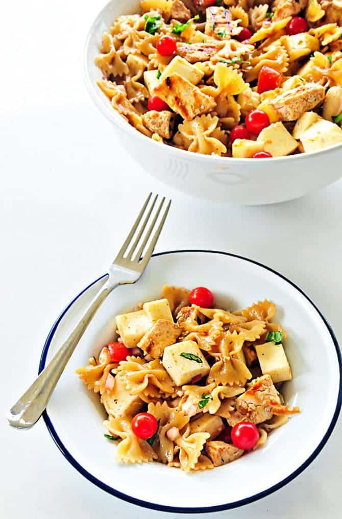 Chicken Caprese Pasta Recipe - this pasta salad recipe is delicious served hot or cold! // addapinch.com 