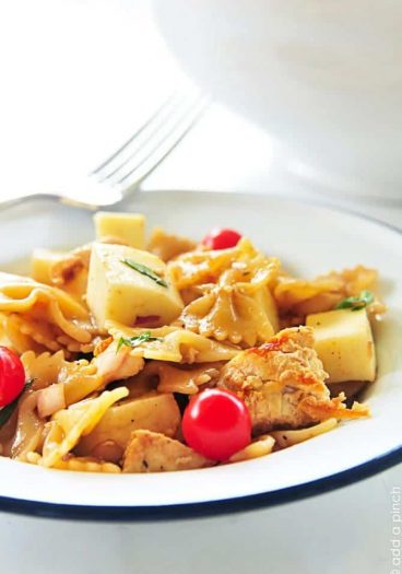 Chicken Caprese Pasta Salad Recipe - this pasta salad recipe is delicious served hot or cold! // addapinch.com