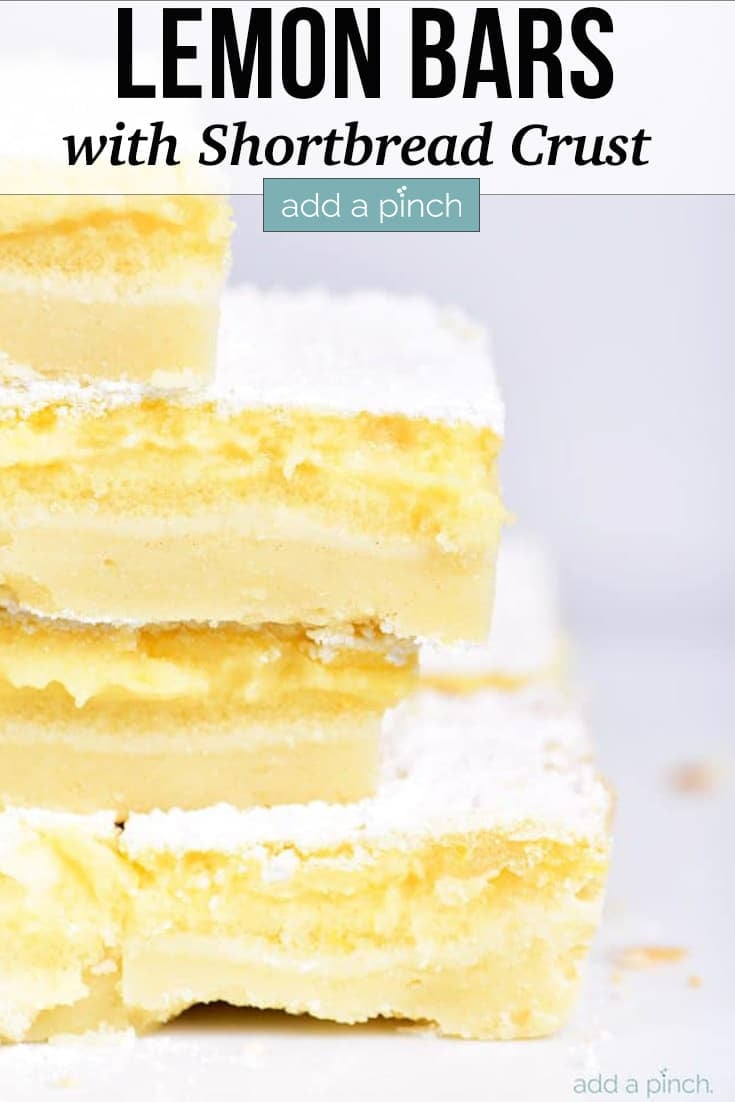 Stack of Lemon Bars, sprinkled with powdered sugar, cut into large squares