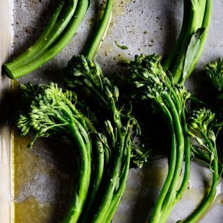 Roasted Broccoli Rabe Recipe - This Roasted Broccoli Rabe recipe makes a quick and easy side dish recipe perfect for weeknight meals! One simple step makes your broccoli rabe tender and tasty! // addapinch.com