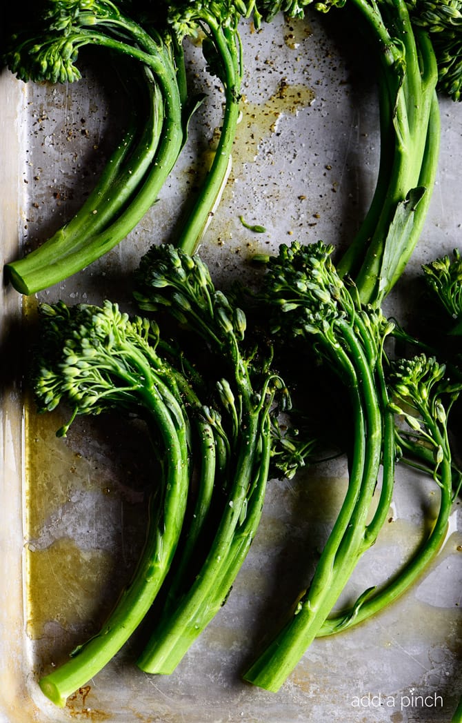 Roasted Broccolini Recipe - This Roasted Broccolini recipe makes a quick and easy side dish recipe perfect for weeknight meals! One simple step makes your broccolini tender and tasty! // addapinch.com
