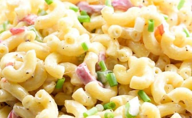 Southern Macaroni Salad Recipe - Southern Macaroni Salad makes a delicious addition for picnics, potlucks, and any get together! An easy make-ahead staple, this macaroni salad is a definite go-to recipe for your summer parties! // addapinch.com
