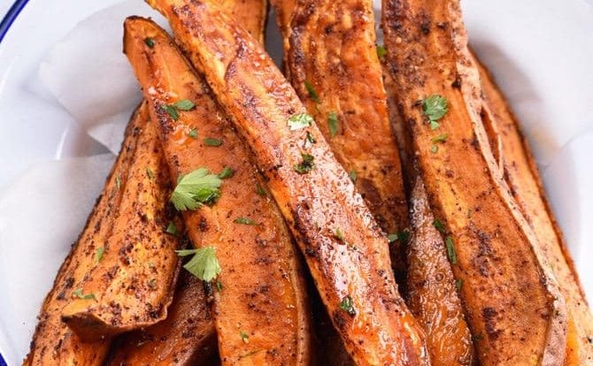 Spicy Sweet Potato Wedges Recipe - Spicy Roasted Sweet Potato Wedges make an easy and delicious recipe! Made with just five ingredients, these roasted sweet potatoes will definitely become a favorite! // addapinch.com