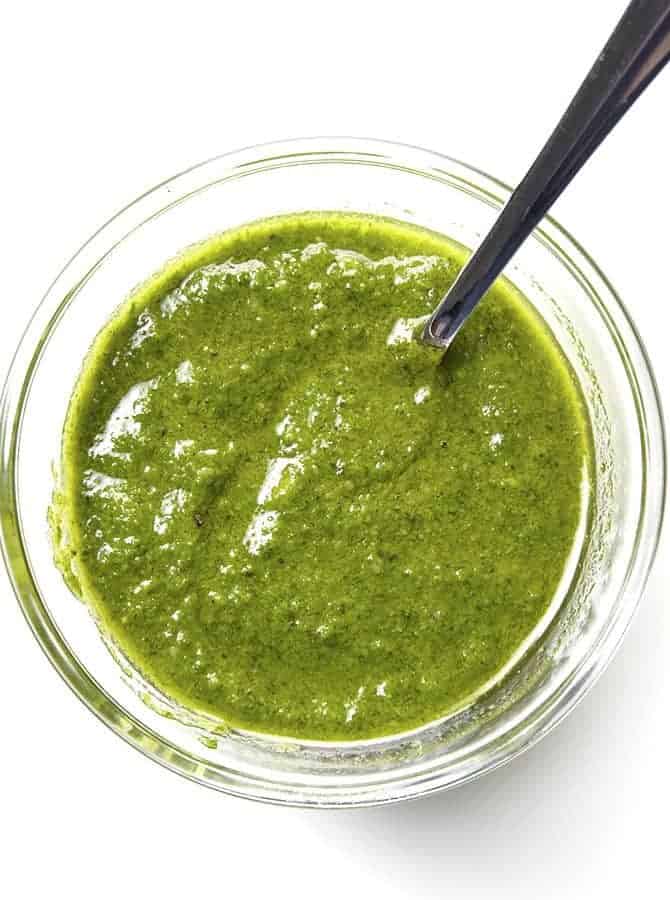 Classic Pesto Recipe - Made of fresh basil, garlic, nuts, olive oil, and cheese, this pesto recipe comes together in minutes and adds so much flavor to so many dishes! // addapinch.com