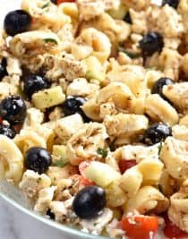Easy Tortellini Pasta Salad Recipe - This easy Tortellini Pasta Salad recipe is a summer staple! Perfect for picnics, potlucks, reunions, or to make ahead for easy meals, this is a pasta salad you'll turn to time and again! // addapinch.com