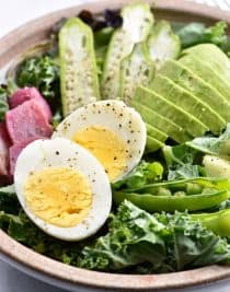 Ultimate Kale Salad Recipe - This Ultimate Kale Salad recipe is the kale salad of my dreams! Filled with crunchy vegetables, creamy avocado and topped with a bold dressing, it is glorious! // addapinch.com