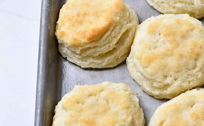 Make Ahead Biscuits Recipe - Make and bake biscuits ahead of time for quick and easy mornings! In less than 30 minutes, you'll have a week's worth of breakfast ready to grab, reheat and go! // addapinch.com
