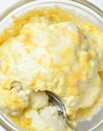 Easy Cheesy Cauliflower Recipe - This easy cauliflower recipe is perfect for weeknight suppers or Sunday dinners! It is a definite favorite the whole family loves! // addapinch.com