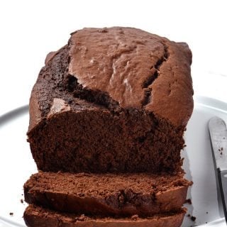 Chocolate Banana Bread Recipe - Take your banana bread to a whole new level with this incredibly most and delicious chocolate banana bread recipe! A definite family favorite! // addapinch.com