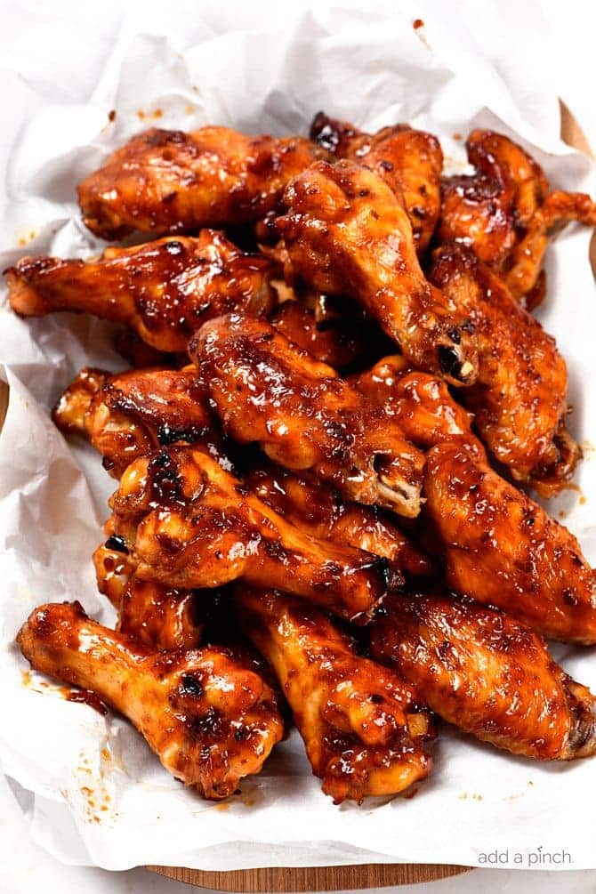 Baked Korean Chicken Wings Recipe - Chicken Wings are always a favorite appetizer, snack, or even an entree! These sweet and spicy baked Korean chicken wings will quickly become a favorite for all of your gatherings! // addapinch.com