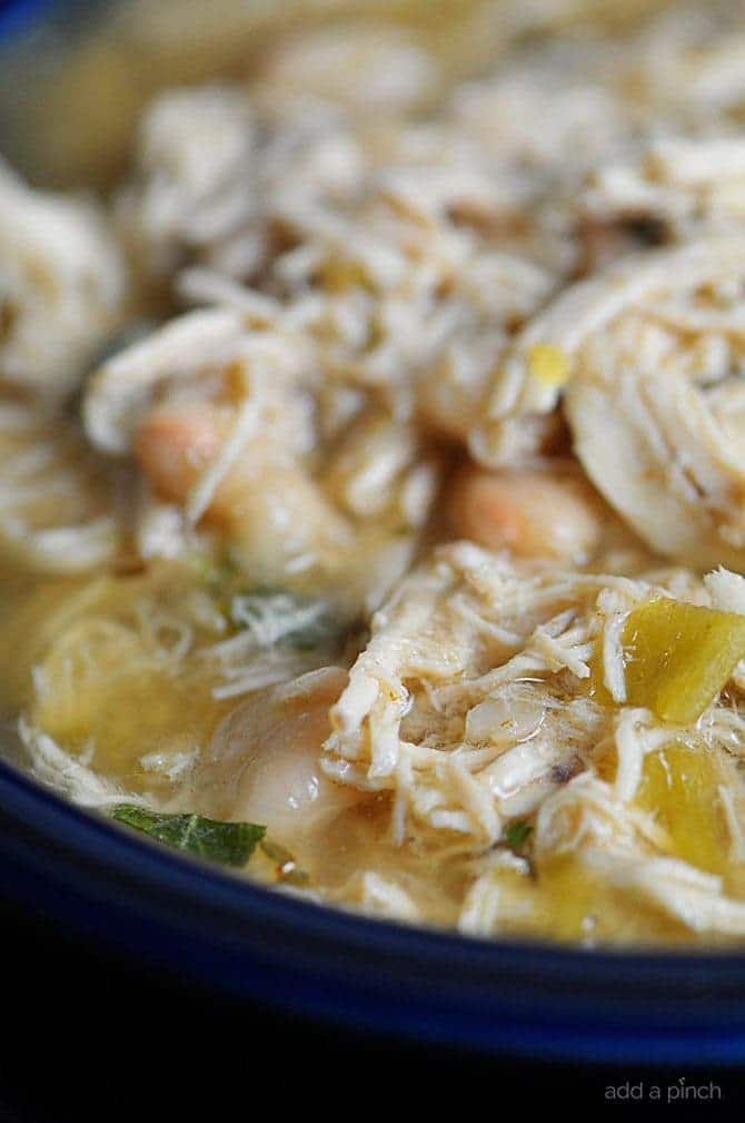 Closeup of White Chicken Chili in a blue bowl. 