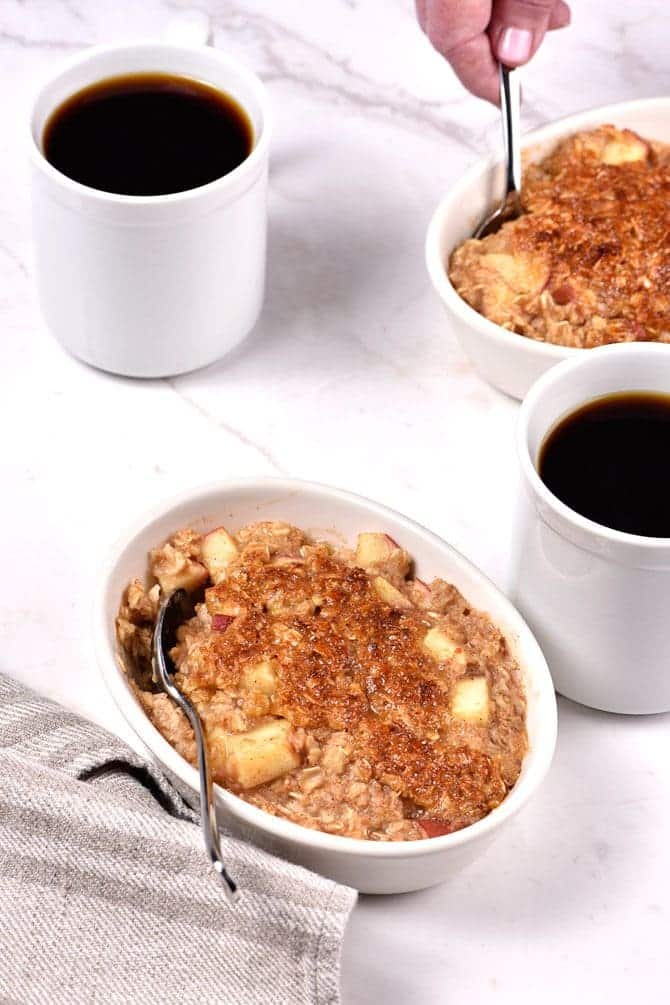 Apple Crisp Oatmeal - Apple Crisp Oatmeal is the perfect combination of everyone's favorite fall dessert and breakfast! Ready in minutes, my apple crisp oatmeal is definitely a family favorite! // addapinch.com