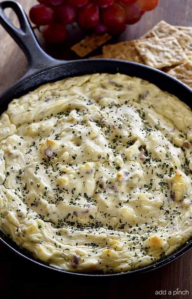 Bacon Blue Cheese Dip Recipe - This Bacon Blue Cheese Dip recipe makes a flavorful dip recipe! Baked in a skillet, this delicious dip is perfect for so many occasions! // addapinch.com