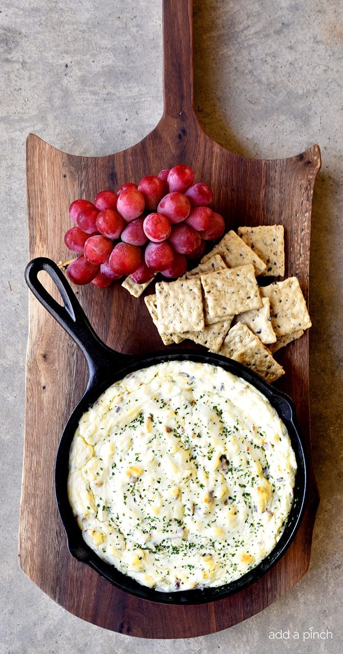 Bacon Blue Cheese Dip Recipe - This Bacon Blue Cheese Dip recipe makes a flavorful dip recipe! Baked in a skillet, this delicious dip is perfect for so many occasions! // addapinch.com