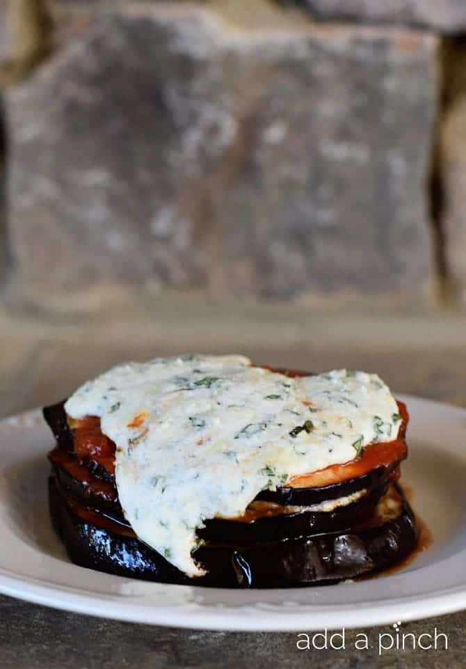 Baked Eggplant Parmesan Stacks Recipe - These Baked Eggplant Parmesan Stacks make a mighty delicious main dish that everyone will love! This quick and easy dish comes together in less than 30 minutes! // addapinch.com