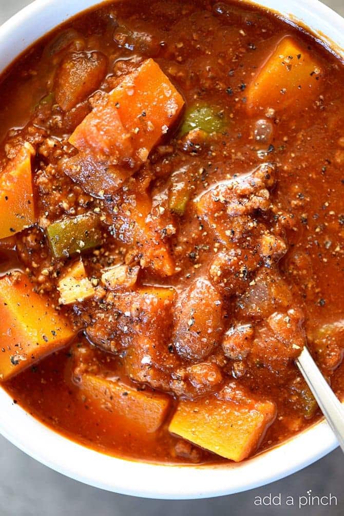 Butternut Squash Chili Recipe - Butternut Squash Chili recipe made with ground beef or turkey, butternut squash, vegetables, and spices makes a hearty and delicious chili recipe! // addapinch.com