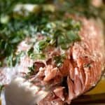 Herb Crusted Salmon in Foil Recipe - A quick and easy baked salmon recipe perfect for a busy weeknight or serving when company comes! A one pan meal that everyone loves made of asparagus, lemon, salmon, topped with an herb crust and baked until tender and delicious! // addapinch.com
