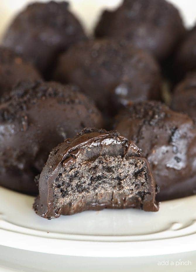 No Bake Oreo Truffles Recipe - These No Bake Oreo Truffles use just four ingredients and come together in a snap! Perfect to make throughout the year, but especially during the holidays! // addapinch.com