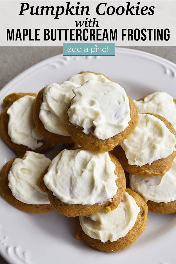 Plate of Pumpkin Cookies frosted with Maple Buttercream Frosting - with text - addapinch.com
